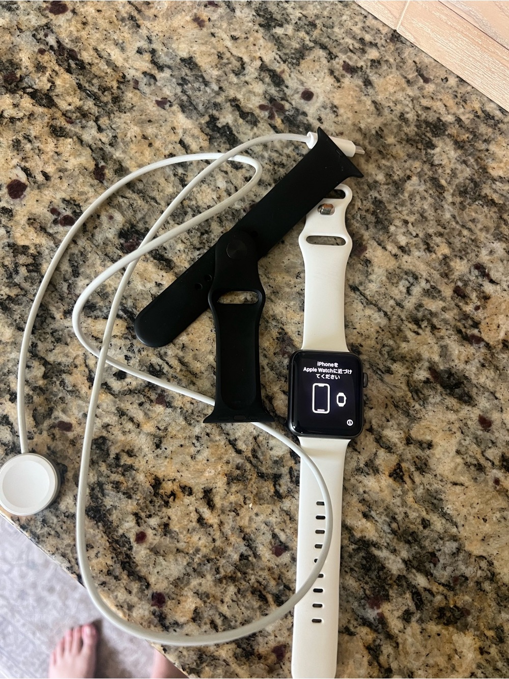 Apple Smartwatch in White with Black Spare Band and original charger